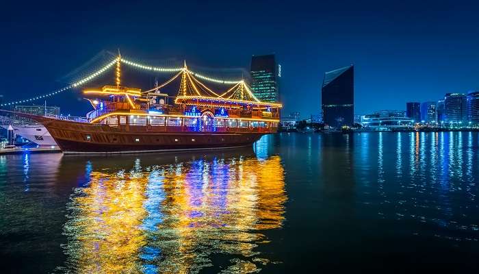 A captivating landscape of a lit dhow cruise.