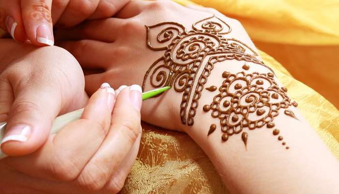 An amazing view of traditional henna which you can get done at the Heritage Village