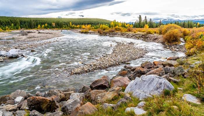 A captivating scene of the Smoky River near Grande Cache, one of the small towns in Alberta