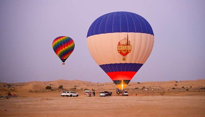A hot air balloon ride in the desert is one of the best spots to witness the Dubai sunset