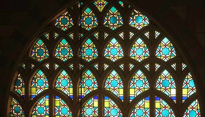  A majestic view of stained glass window within the Museum of Islamic Civilization in Sharjah