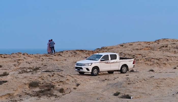 The picturesque landscape of the beautiful Jebel Fuwairit Beach, one of the best places to visit in Qatar during summer.