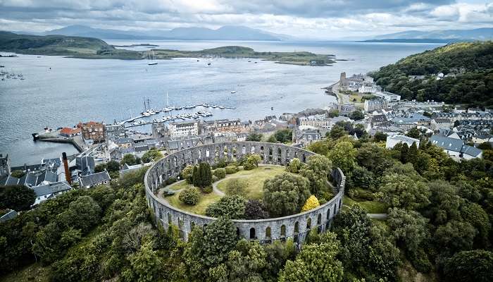 The aerial view of McCaigs Tower in the heart of the prettiest village in Scotland, Oban