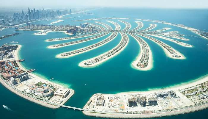The beautiful aerial scene of one of the private beaches in Dubai in Palm Jumeirah. 