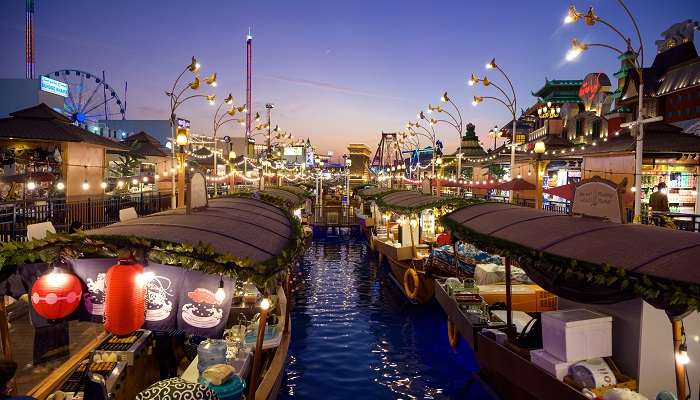 Shop at the floating market in the Global Village Dubai