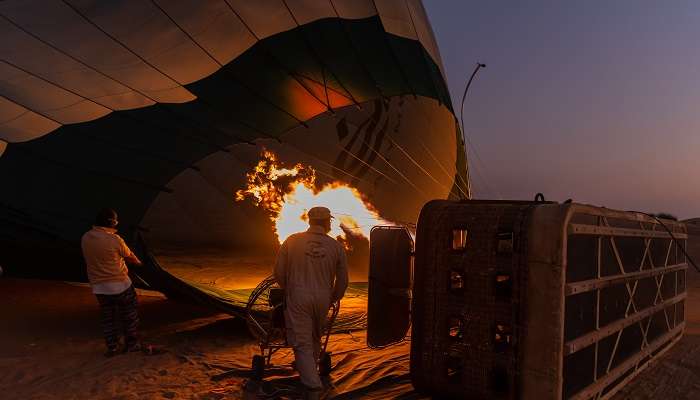 Hot air balloon being prepared for flying over the desert in Dubai