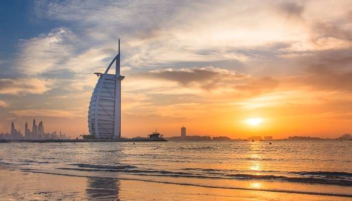 A scenic view of Dubai sunset at Umm Suqeim Beach, also known as Sunset Beach