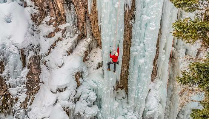 An ice climber ascending at Ouray Ice Park in Colorado.