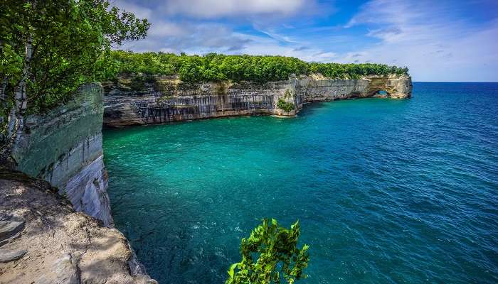 Witness the beauty of nature at Pictured Rocks National Lakeshore, one of the picturesque camping sites in Michigan