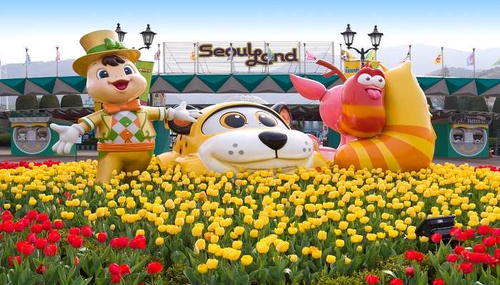 The views of tulips and cartoon characters at the entrance of Seoul Land in South Korea.