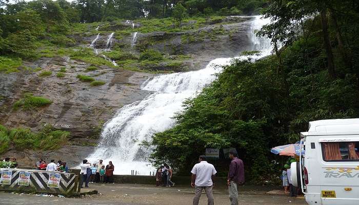 The breathtaking view of waterfalls near Adimali, on the route from Munnar to Vagamon road trip.