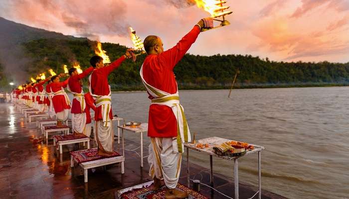 Priests doing aarti.