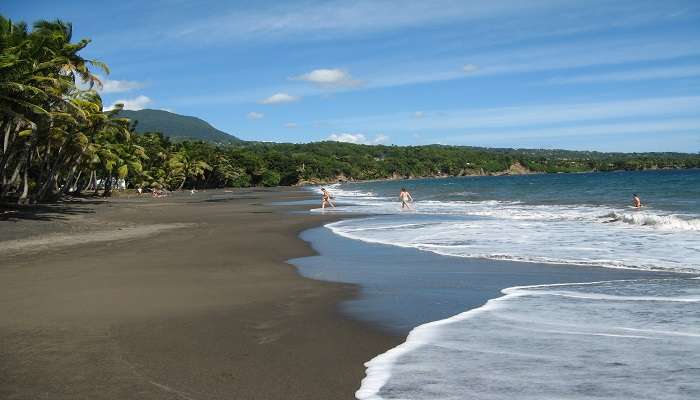 Black sand beach of Grande Anse Cocos 