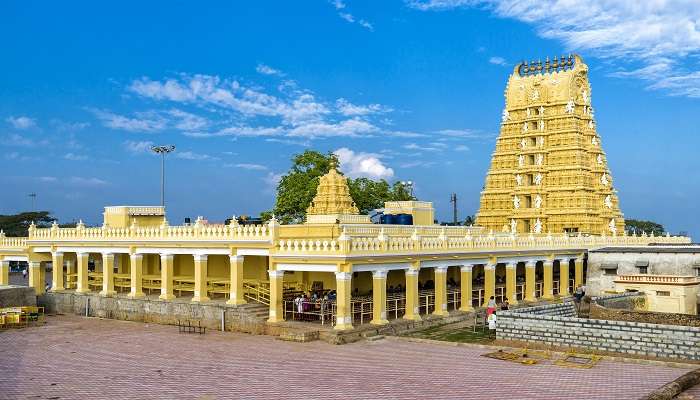 Impressive view of the Chamundeshwari Temple, rising against the sky with its grand architecture.