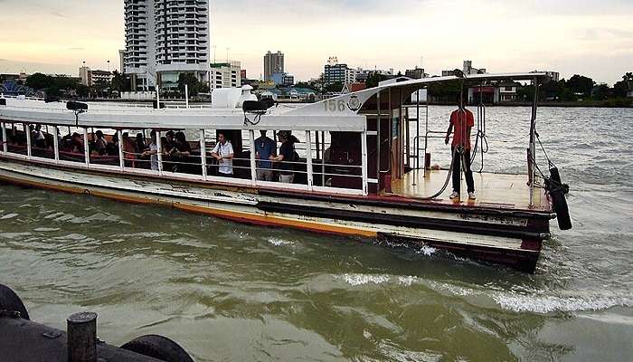 Take a boat trip along the Chao Phraya River, while visiting Wat Paknam. 