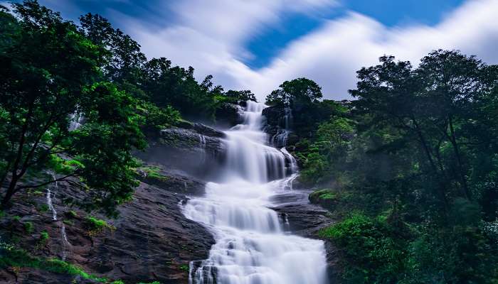 The surreal view of Cheeyappara Waterfalls during Cochin to Munnar road trip.