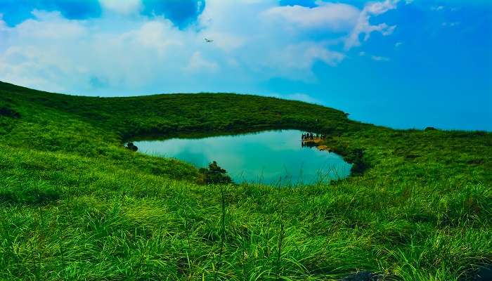 Astonishing Chembra Peak with a small pond, another offbeat places in Wayanad for couples.
