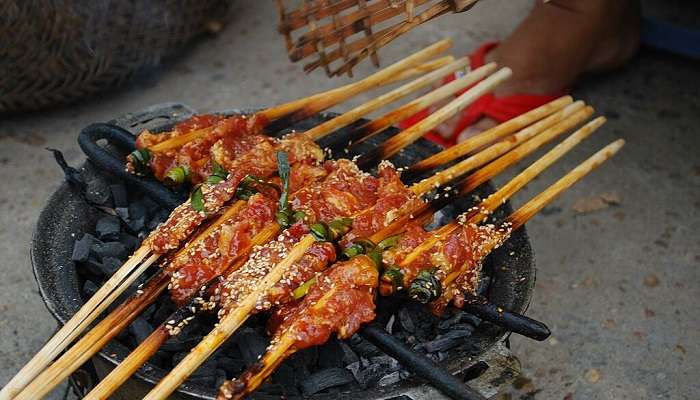 Pork skewers, a delicious dish that can be found in Ta Hien Street