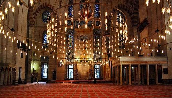 The beautiful interiors of the dome-like structure of the Suleymaniye Mosque in Istanbul, Turkey