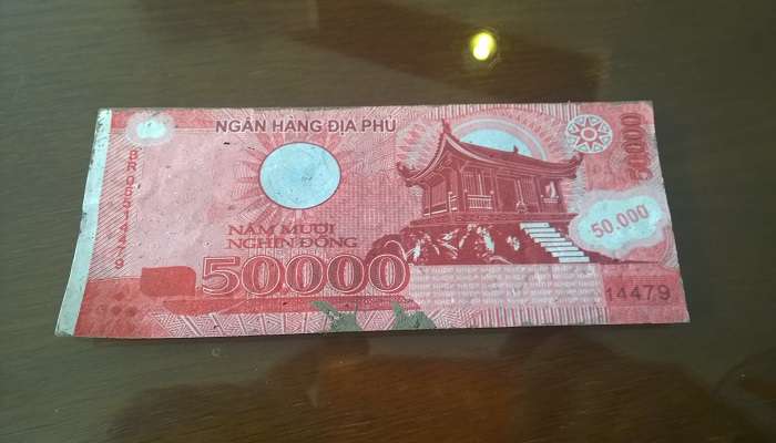 Dong is the currency in Vietnam. Foreigners need to pay for their permit