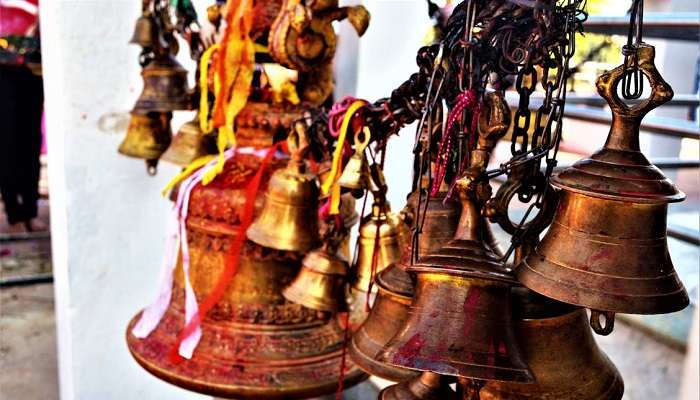 bells at the entrance of the Temple to worship the lord.