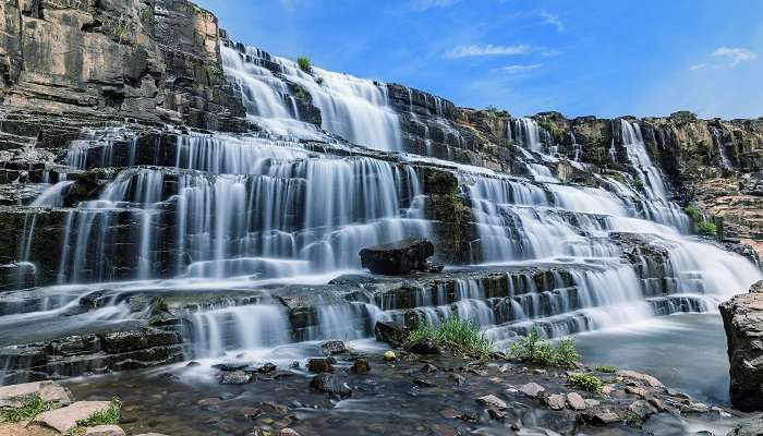The stunning Pongour Waterfall in Dalat, Vietnam, is a must-see among the top things to do in Dalat Vietnam.