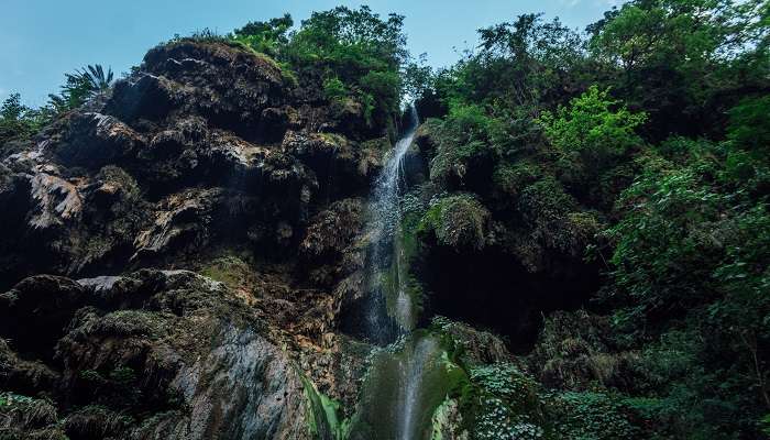 Stunning Garud Chatti Waterfall is a hidden oasis and one of the top offbeat places in Rishikesh among nature lovers.