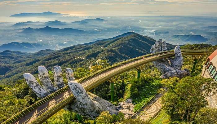 Spanning 25 kilometres, through the Ba Na Mountains, Vietnam’s Golden Gate Bridge is one of the best places to visit