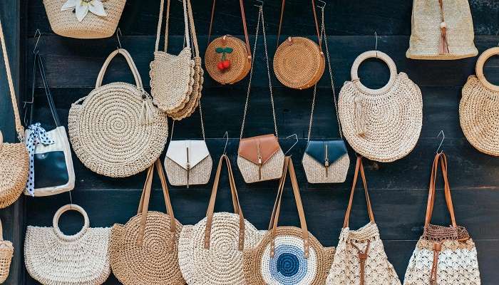complete your shopping by purchasing the round rattan handbags in Ubud Bali market.