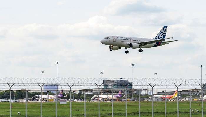 Combodia Airways plane is landing on runway at Suvarnabhumi International Airport