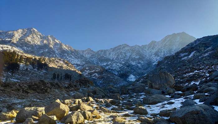 Blanketed in pristine white snow, the majestic Indrahar Pass trek is one of the best spots for trekking near Dharamshala