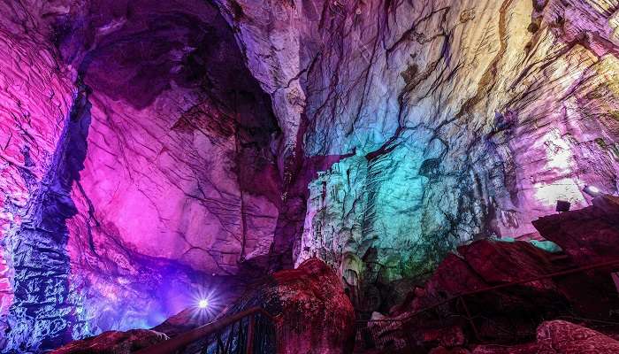 colourful lighting at the Kajal Rani cave near the Omkareshwar Mandir