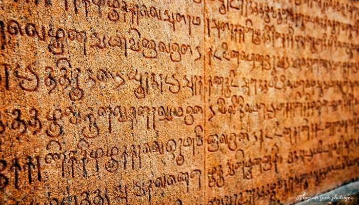 Tamil inscriptions on the temple walls showcase the historical records of the temple.