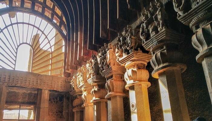 View the intricate carvings of Karla caves, near Ekvira Temple.