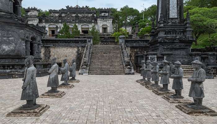 An ornate memorial in Vietnam, showcasing unique architecture blending Vietnamese and European influences.