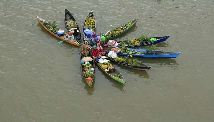 Locals are selling goods in the floating market in Long Xuyen