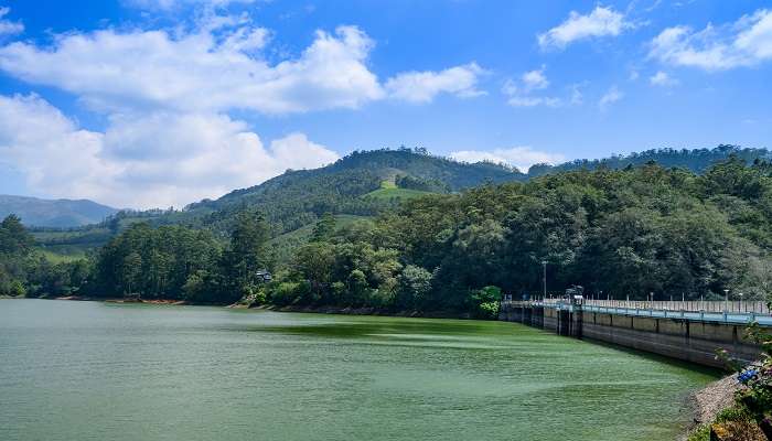 Marvel at the serene waters and lush terrains while exploring Mattupetty Dam, one of the offbeat places in Munnar.