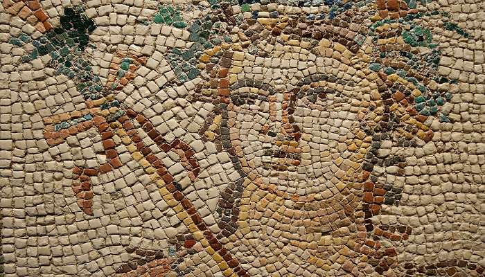 The mosaic of Medusa with a head of snakes, a Greek mythological creature