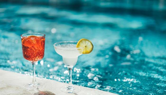 Take a refreshing dip at the swimming pool of Paradise Resort Kumarakom Kerala.