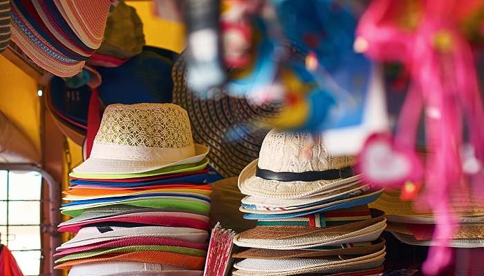 Buy clothes and caps at Ratnam Market, which is a popular place for shopping in Port Blair.