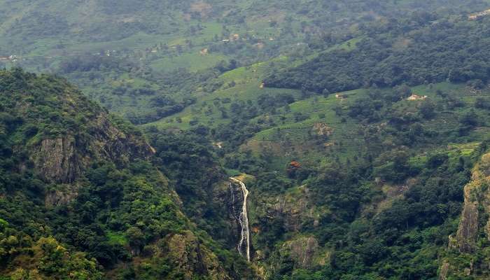 The vista of Catherine Falls from Dolphin's Nose viewpoint Ooty to Munnar road trip.