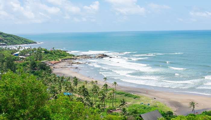 The vista of Vagator Beach in Goa one must experience during Goa to Gokarna road trip.