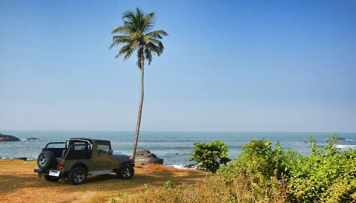 A car parked on the Vagator Beach, Goa.
