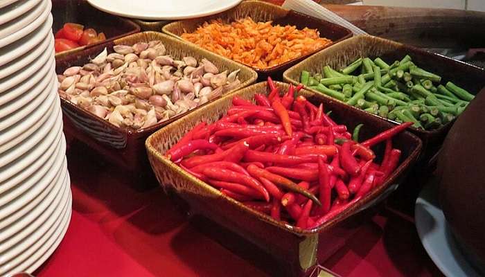 Lavish buffet spread at Siam Niramit Bangkok, featuring various Thai dishes.