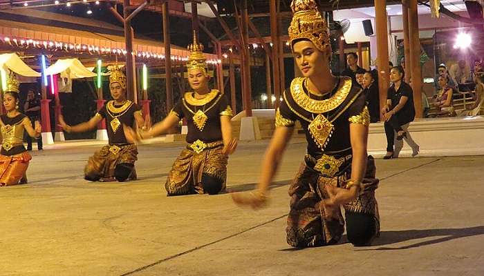 Vibrant stage performance at Siam Niramit Bangkok showcasing traditional Thai costumes and dance.