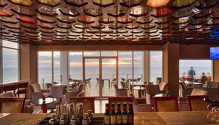 Enjoy sipping your favourite drink as you watch the hued sunset from The Sunset Bar