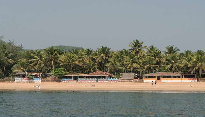 The scenic vista of Om Beach, home to the best beach resorts in Gokarna.