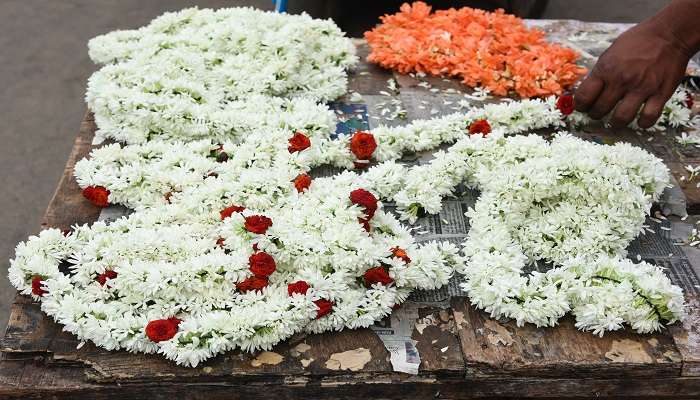 Offering flowers at Nileshwar temple
