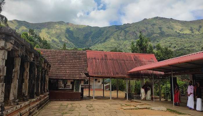Serene view of Ancient Thirunelli Temple, one of the holistic temples near Manikavu Temple.