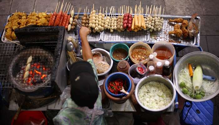Do savour authentic street food while exploring the attraction.